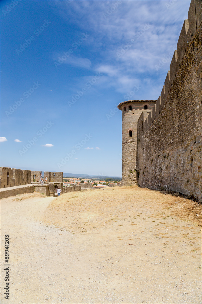 the bottom of the towers and the site of the high walls of the fortress of Carcassonne, France