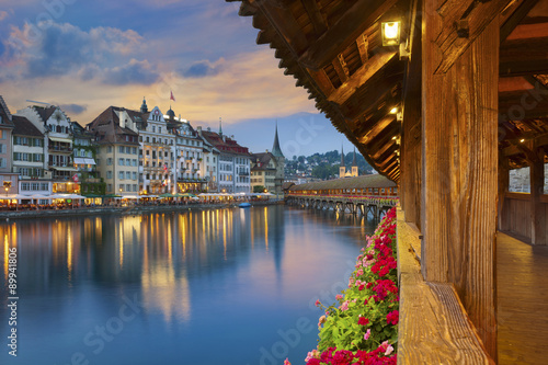 Платно Lucerne. Image of Lucerne, Switzerland during twilight blue hour.