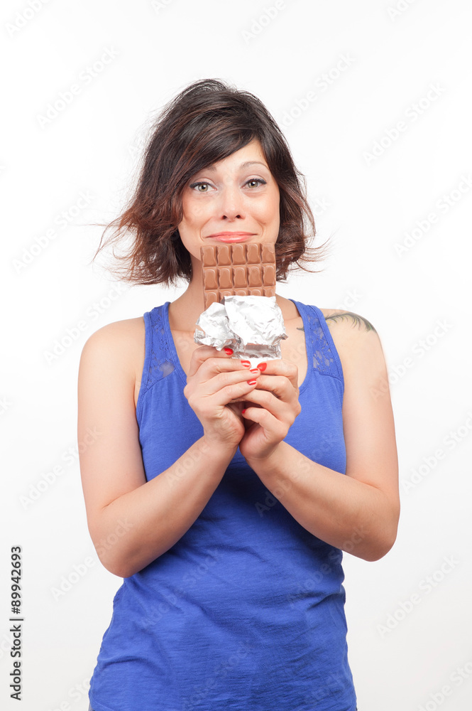 young and beautiful girl with a chocolate young and beautiful girl with a chocolate