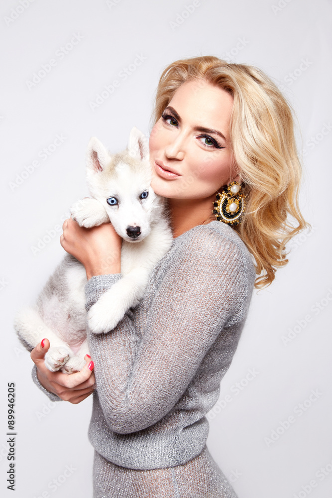 Beautiful sexy woman hug pets dog makeup dress blond Beautiful sexy woman hug pets dog makeup dress blond