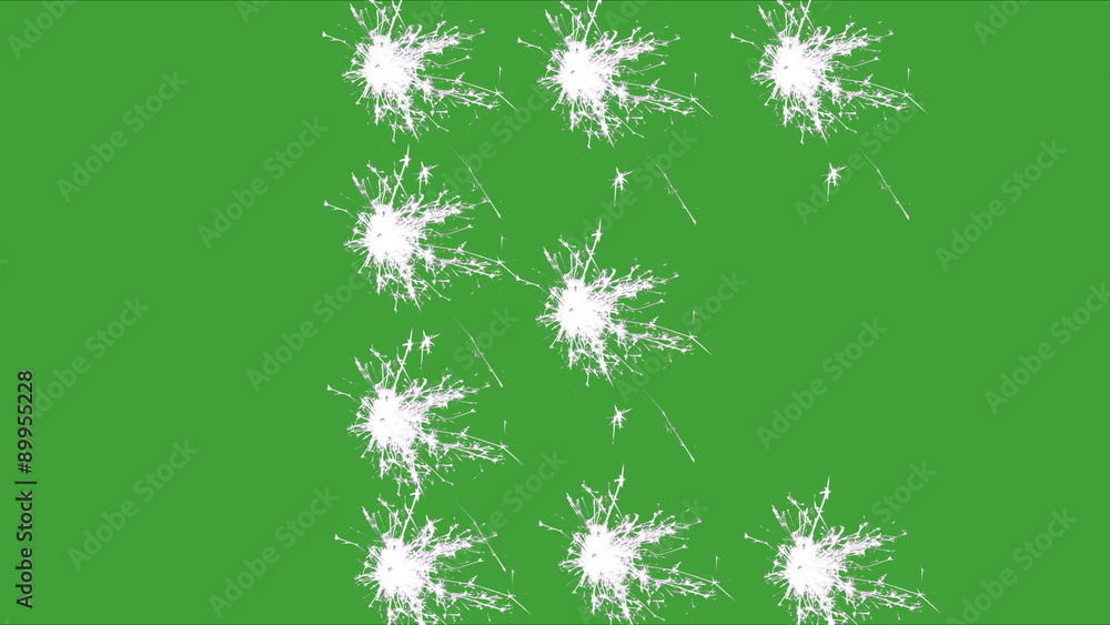 Capital letter E spelled with white sparklers on green screen. Capital letter E spelled with white sparklers on green screen.