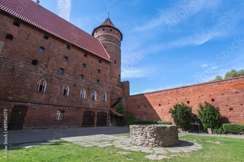 OLSZTYN, POLAND - AUGUST 21, 2015: Old teutonic castle in Olsztyn (Gothic Crusaders castle), tourist attraction of eastern Poland