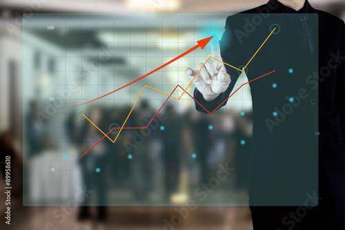 businessman present graph of business