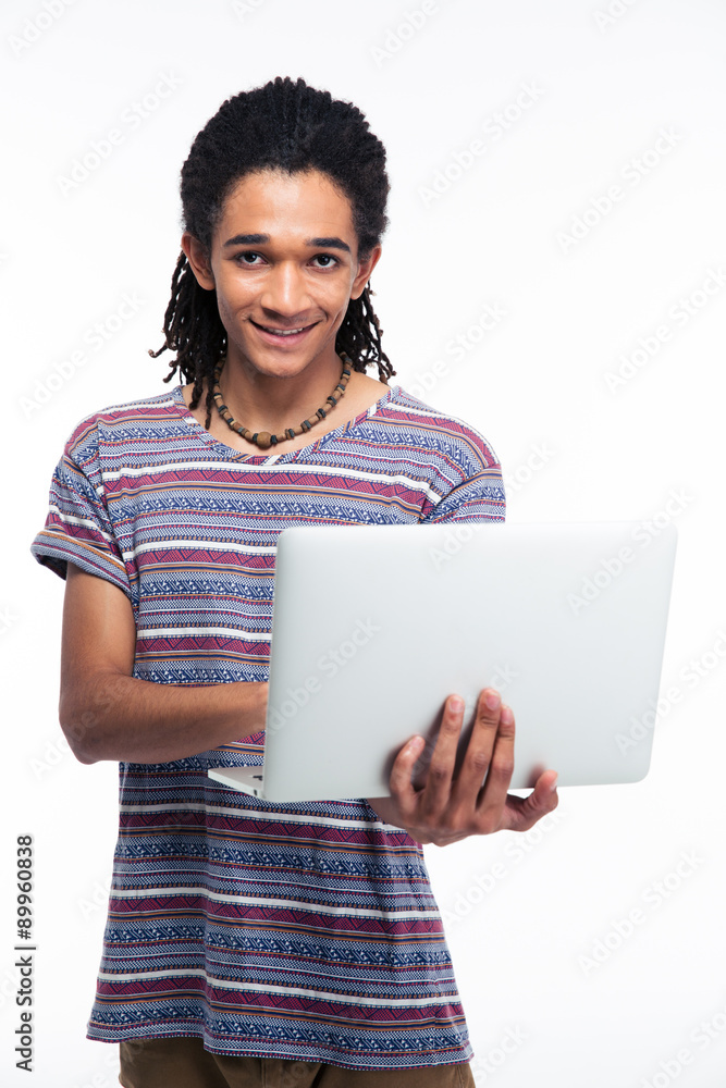 Portrait of a smiling afro american man using laptop Portrait of a smiling afro american man using laptop