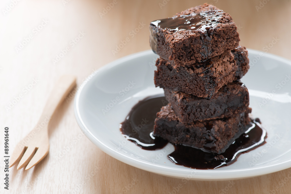 Chocolate brownies on white plate. Chocolate brownies on white plate.