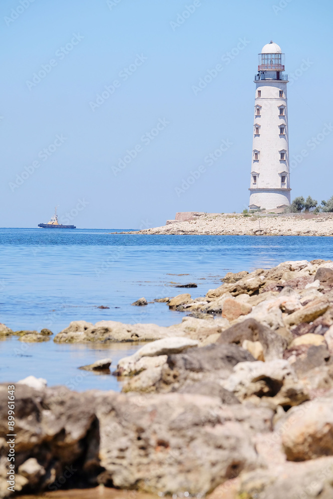 Sea landscape with the image of a lighthouse