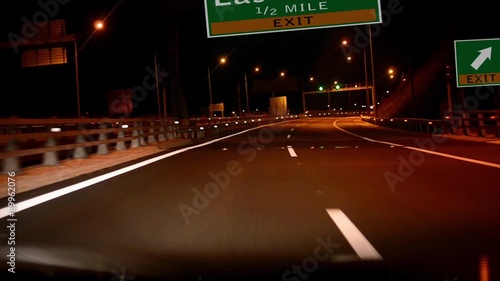  Driving on Highway/interstate at night,  Exit sign of the City Of Las Vegas, Nevada photo