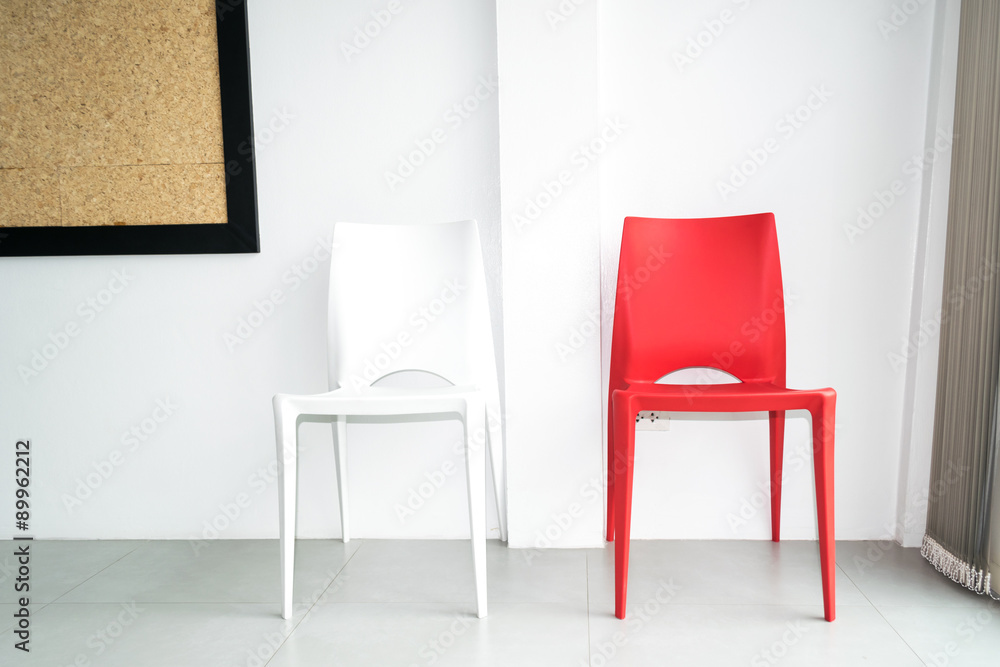 Red chair on the white room. Red chair on the white room.