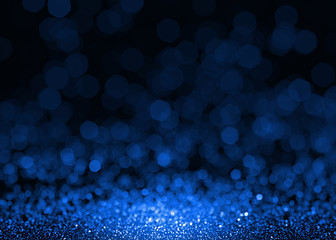 Blue sparkle glitter abstract background.