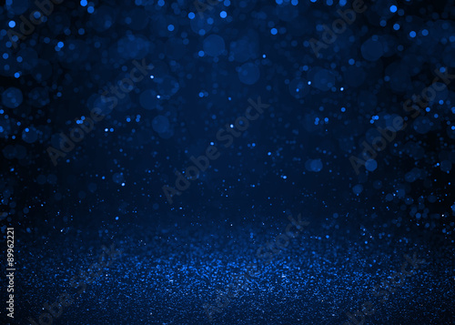 Blue sparkle glitter abstract background.