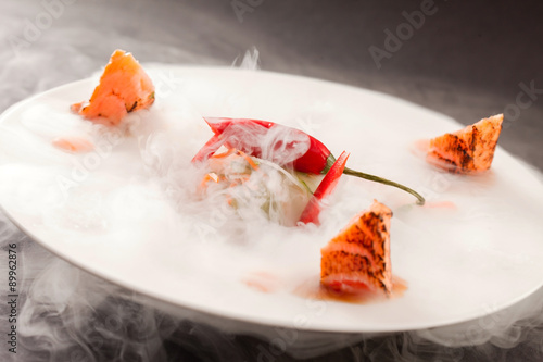 Liquid nitrogen treated salmon and chili pepper photo