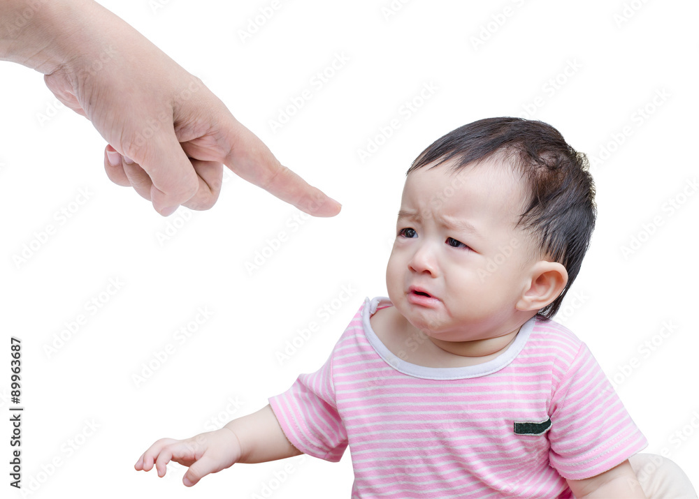 Asian baby crying while mother scolding on white background isol Asian baby crying while mother scolding on white background isol