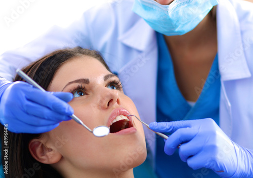 Woman dentist working at her patient amp amp amp  39 s teeth