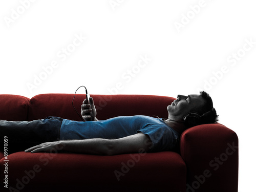 man sofa couch listening music audio 