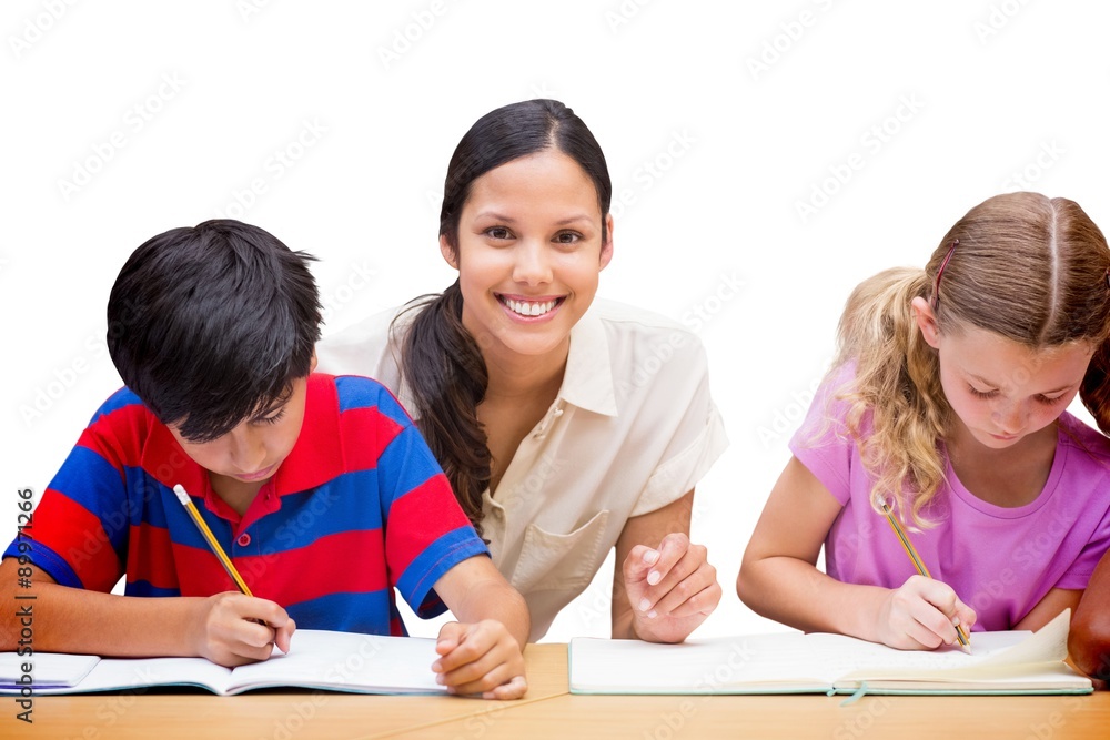 Composite image of pretty teacher helping pupils in library Composite image of pretty teacher helping pupils in library
