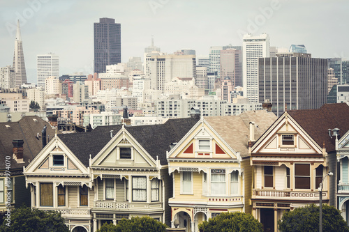 Seven Sisters - Victorian homes on Steiner Street, view from Alamo Square with the San Francisco skyline behind