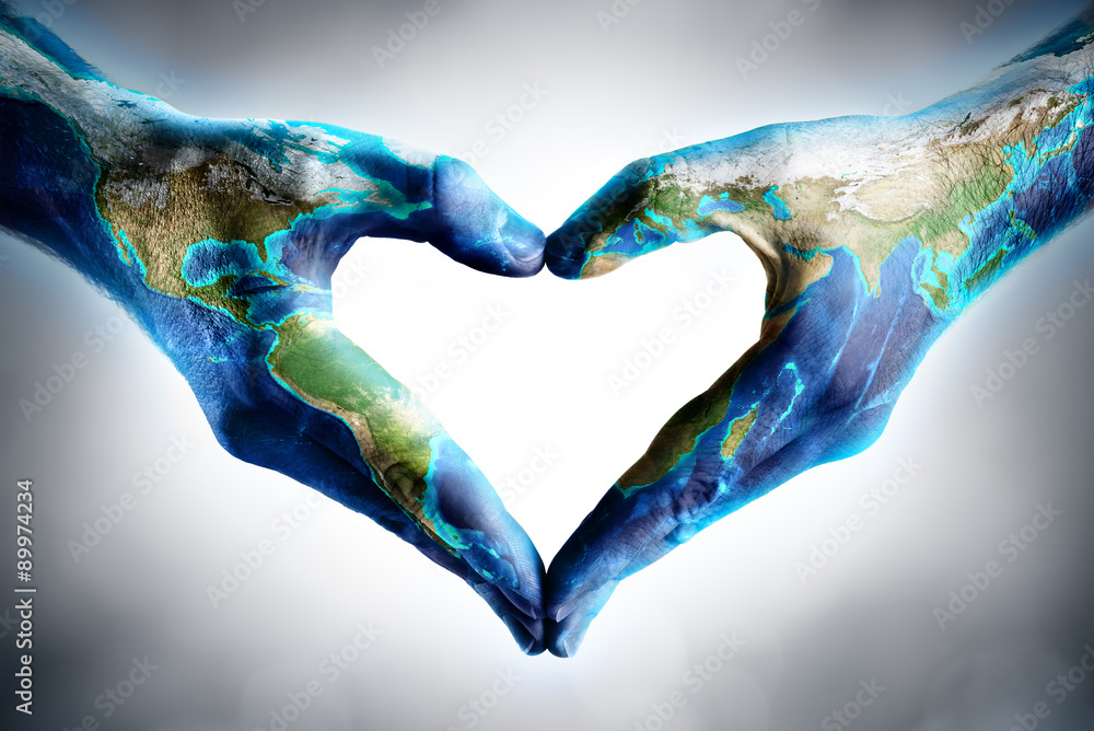 earth's day celebration - hands shaped heart with world map
 - obrazy, fototapety, plakaty 