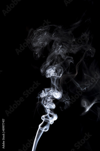gray smoke on a black background.