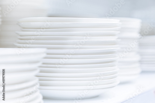Dishes Plates stacked white and clean tableware