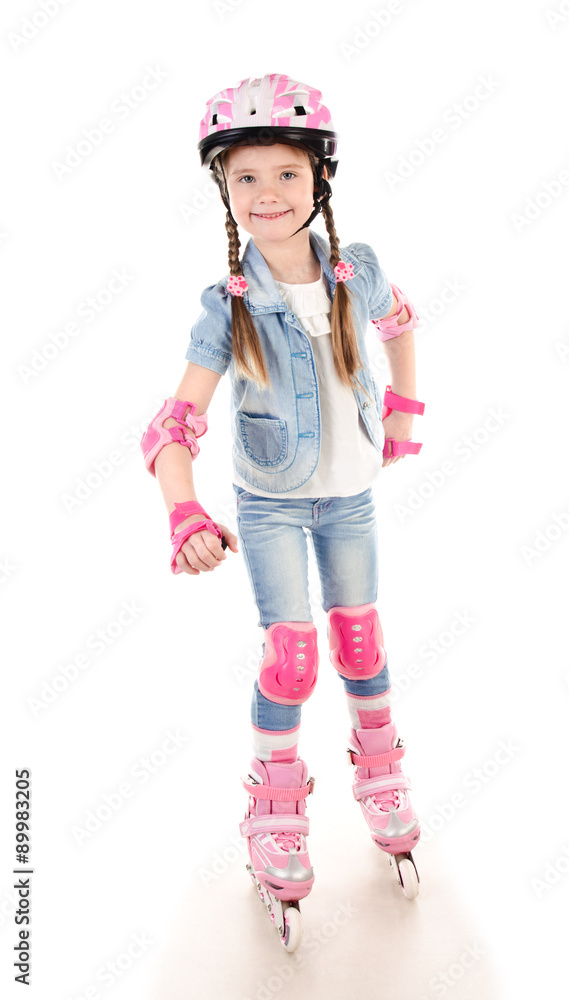 Cute smiling little girl in pink roller skates Cute smiling little girl in pink roller skates