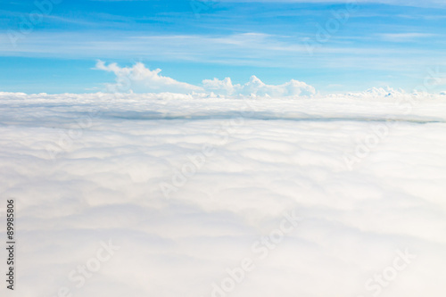 Top view from The airplane blue sky and white cloud © Sirichai Puangsuwan