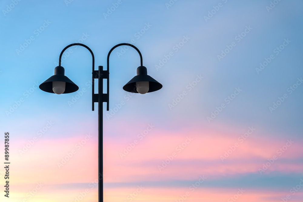 Street light against twilight or sunset background. Street light against twilight or sunset background.