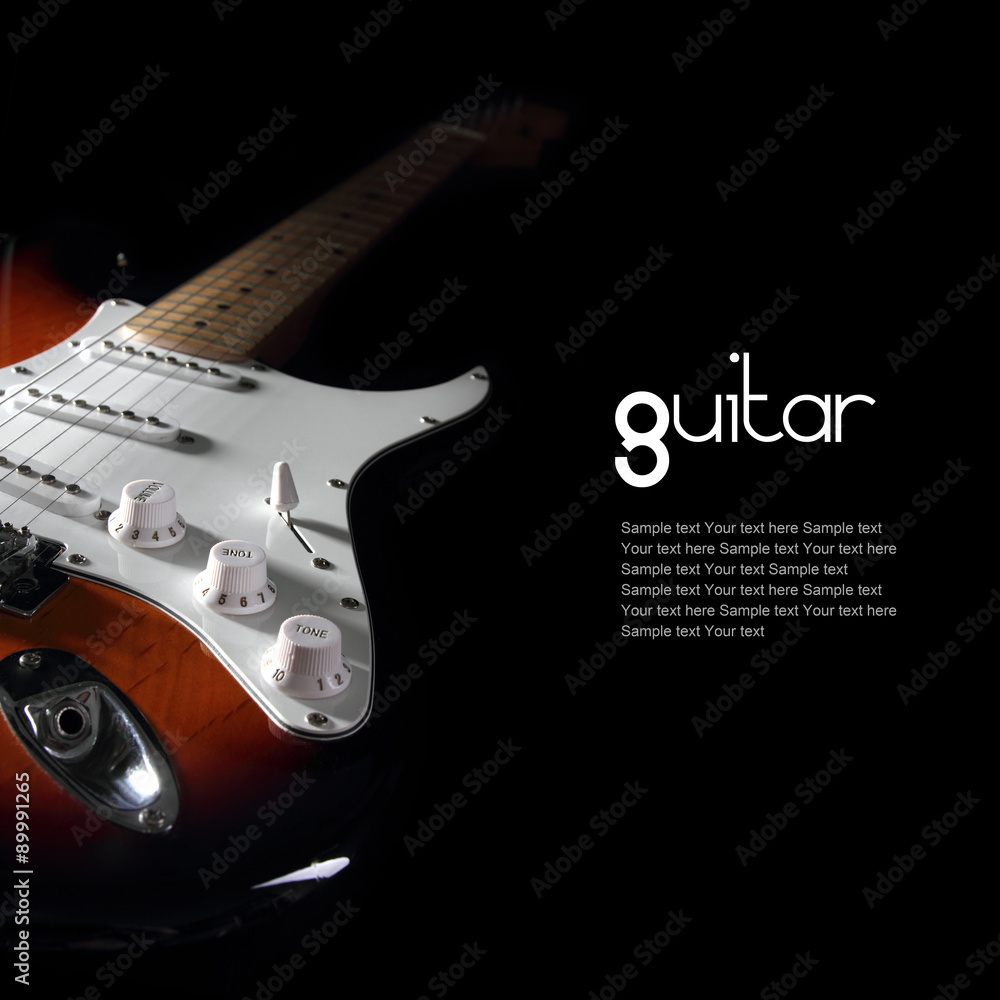 Obraz premium Electric guitar on dark background. Removable sample text.