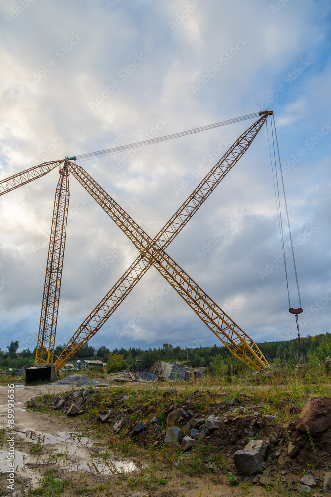 Lifting crane hewn rocks in a quarry