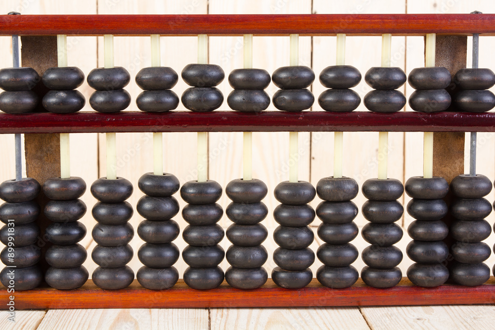 Wooden abacus on table wood texture background. Wooden abacus on table wood texture background.