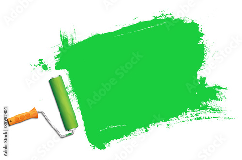 Green paint roller in action