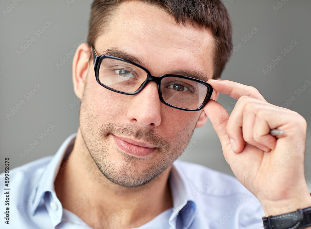 portrait of businessman in eyeglasses at office portrait of businessman in eyeglasses at office