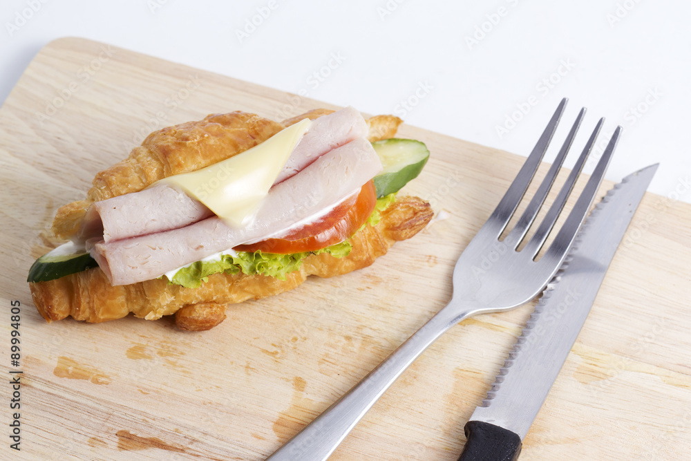 Obraz premium croissant sandwich with ham cheese