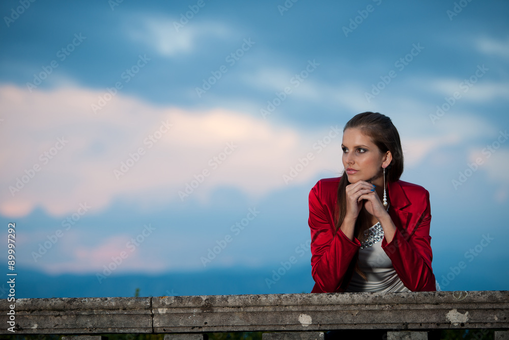 Fototapeta premium Blog style beautiful brunette woman in fashionable dress posing