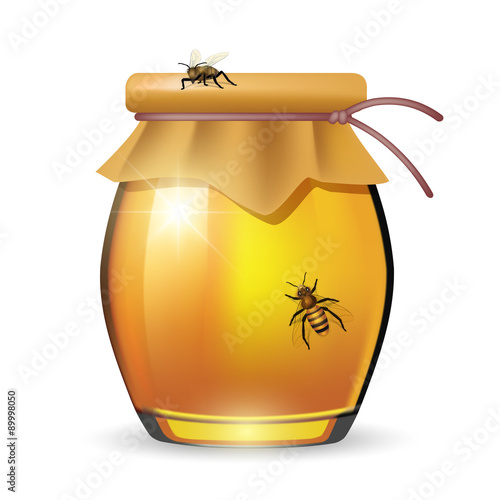 Glass jar of honey