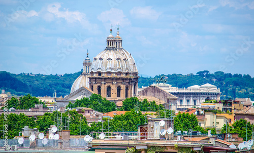 aerial view of rome from the top of aventine hill in rome, which offers view of capitoline hill, vittoriano monument and basilica of saint peter in vatican. photo