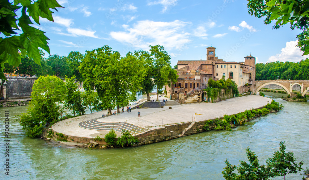 isola tiberina is the biggest island of tibera river in rome. This small  island is attractive touristic spot on the way to trastevere district.  Photos | Adobe Stock