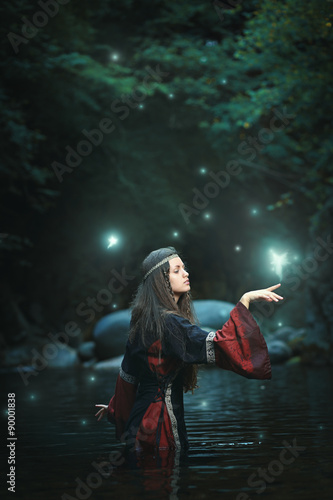 Medieval woman in fairy stream
