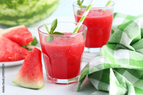Fresh watermelon juice in the glass on wooden table