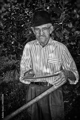 Wrinkled and expressive old farmer