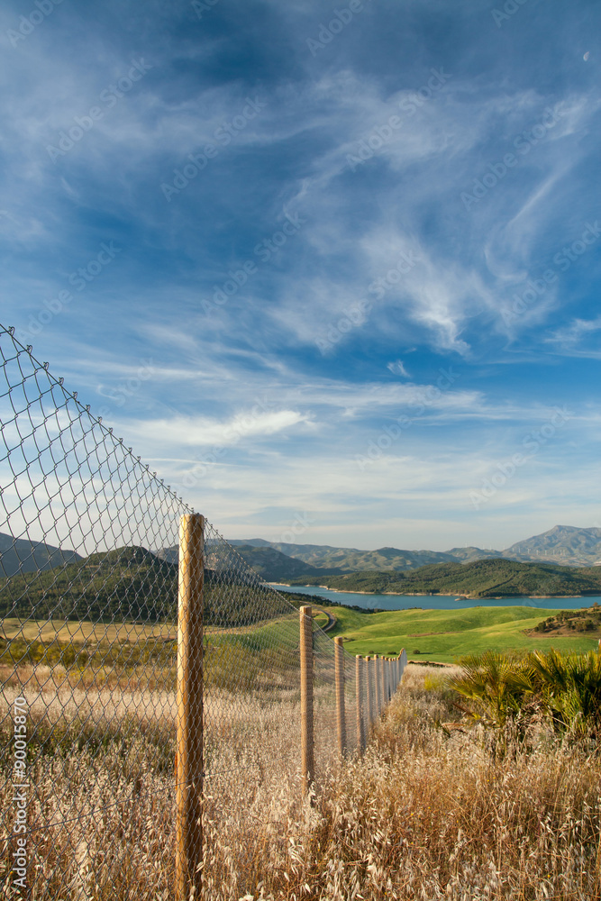 Shot of fence in beautiful Andalusia landscape in Spain