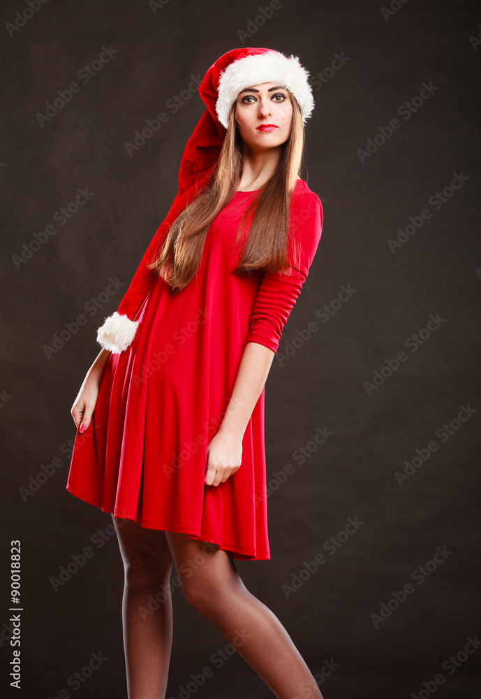 woman wearing santa claus hat on black woman wearing santa claus hat on black