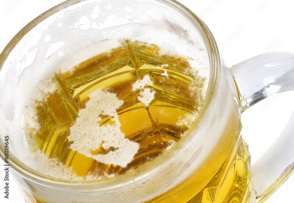 Beer head shaped as Northwest Territories in a beer mug.(series) Beer head shaped as Northwest Territories in a beer mug.(series)
