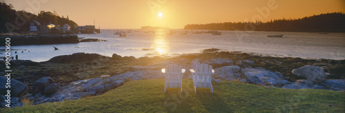 Lawn chairs at sunrise at Lobster Village, Tenants Harbor, Maine photo