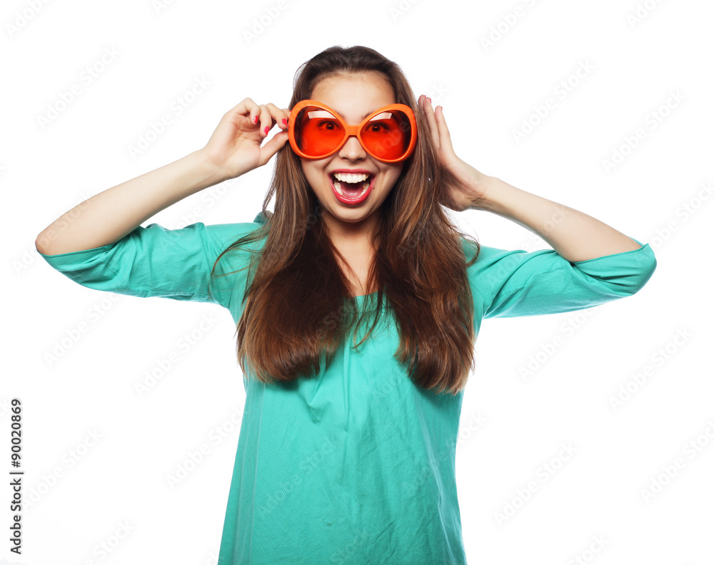 Playful young woman with party glasses. Ready for good time. Playful young woman with party glasses. Ready for good time.