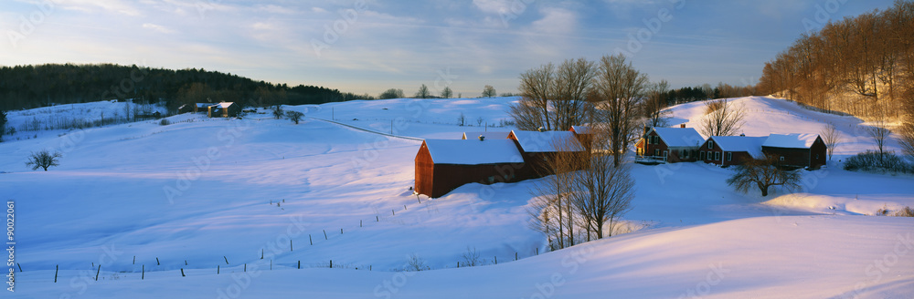 Naklejka premium This is the Jenne Farm at sunrise. The surrounding countryside is buried in snow. It is representative of New England in winter.