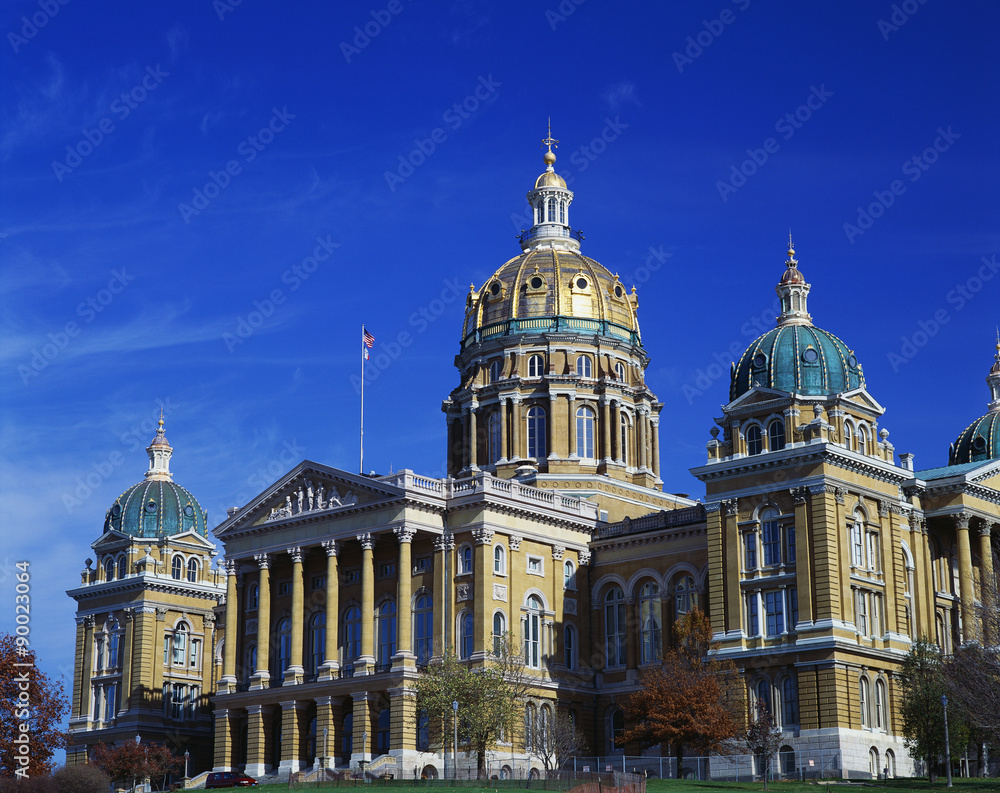 This is the exterior of the State Capitol against a blue sky.