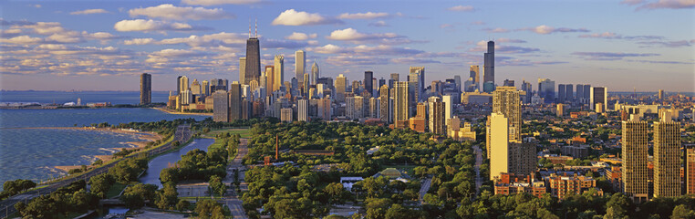 This is Lincoln Park with Diversey Harbor in the foreground and Lake Michigan on the left looking south. It shows the skyline in morning light in the summer.  The John Hancock Building is fairly prominent toward the left hand side.