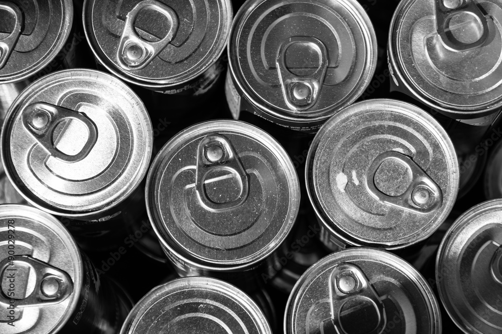 Metal cans. Top view. Close-up. Black and white. Metal cans. Top view. Close-up. Black and white.