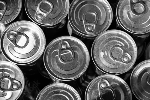 Metal cans. Top view. Close-up. Black and white.