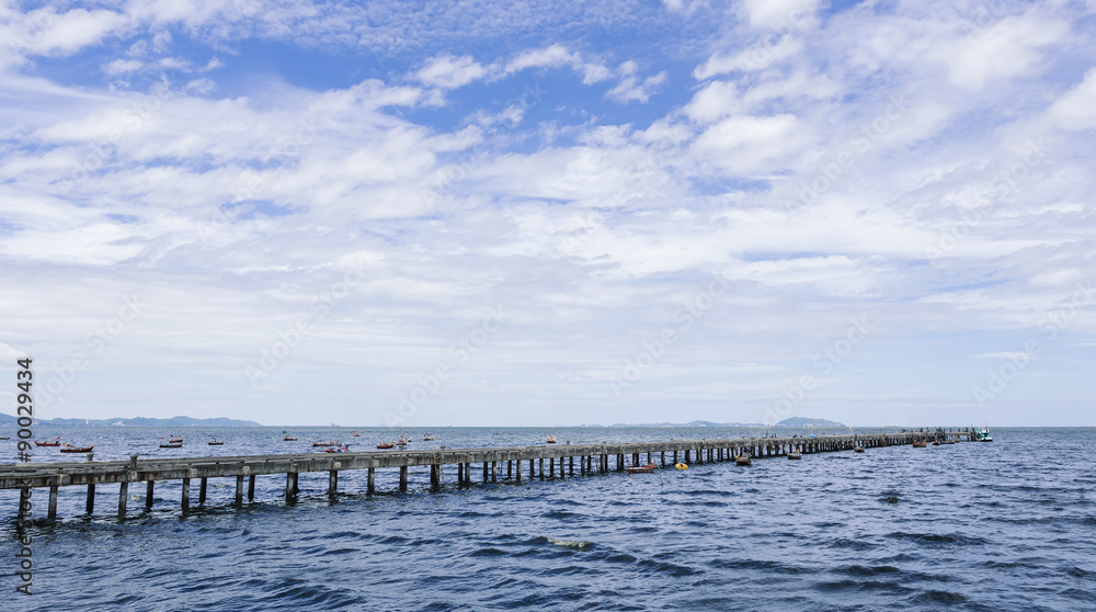 Bridge along the Ocean with Blue sky landscape